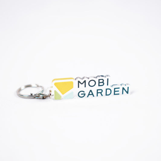 Mobi Garden Gantungan Kunci Akrilik Transparan Logo Mobi Garden Keychain Accessories